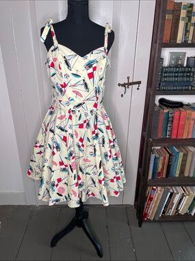 Vintage-Inspired Cream Nautical Print Sundress with Tie Straps. Bettie Page